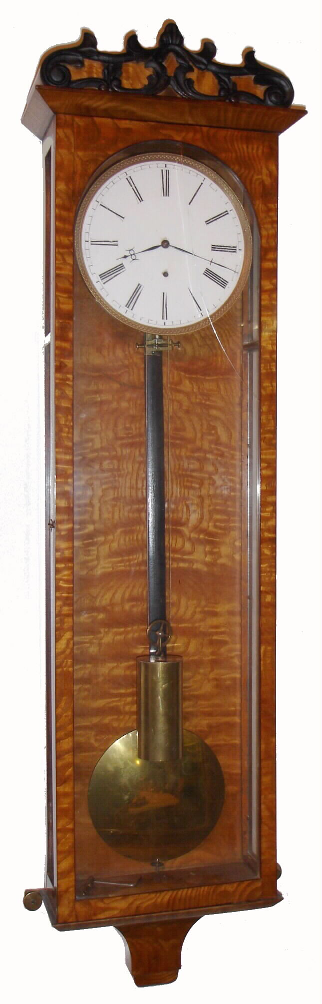 Austrian, earlier Vienna timepiece, a "Biedermeier" of longer duration [5 wheels in train and winds left] in a burled elm case, one piece porcelain dial and engine pattern cast bezel, c1840 — Antique Clocks Price Guide