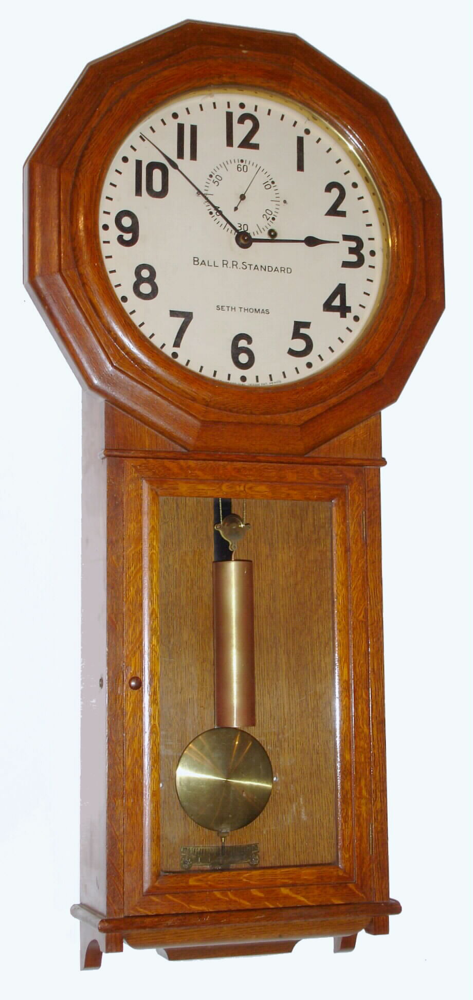 Ball RR Standard, Cleveland, OH, Railway regulator, an oak case similar to Seth Thomas Clock Co., Thomaston, Conn., "Regulator No. 3", and the movement, bracket, pendulum, pulley, etc, supplied by Seth Thomas Clock Co of Conn, c1925 — Antique Clocks Price Guide
