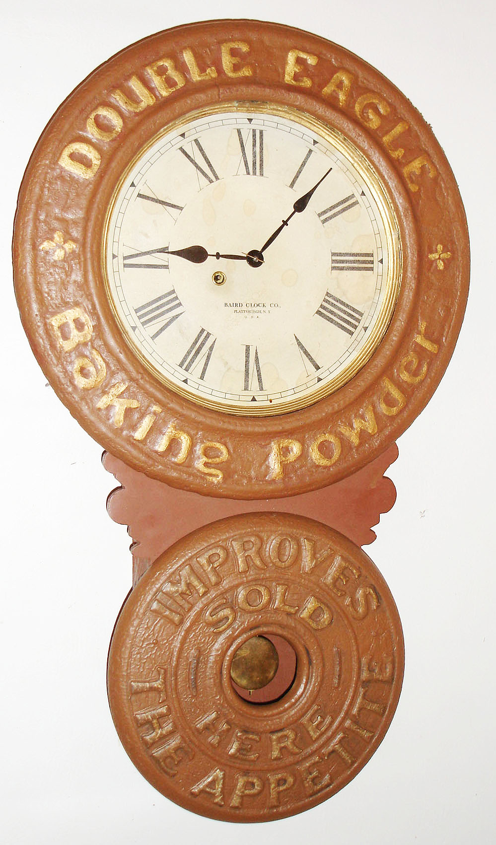 Baird Clock Co., Plattsburgh, NY, "Double Eagle Baking Powder" advertising wall clock, 8 day, time only, spring driven movement in wooden case with paper mache doors and paper dial, c1893 — Antique Clocks Price Guide