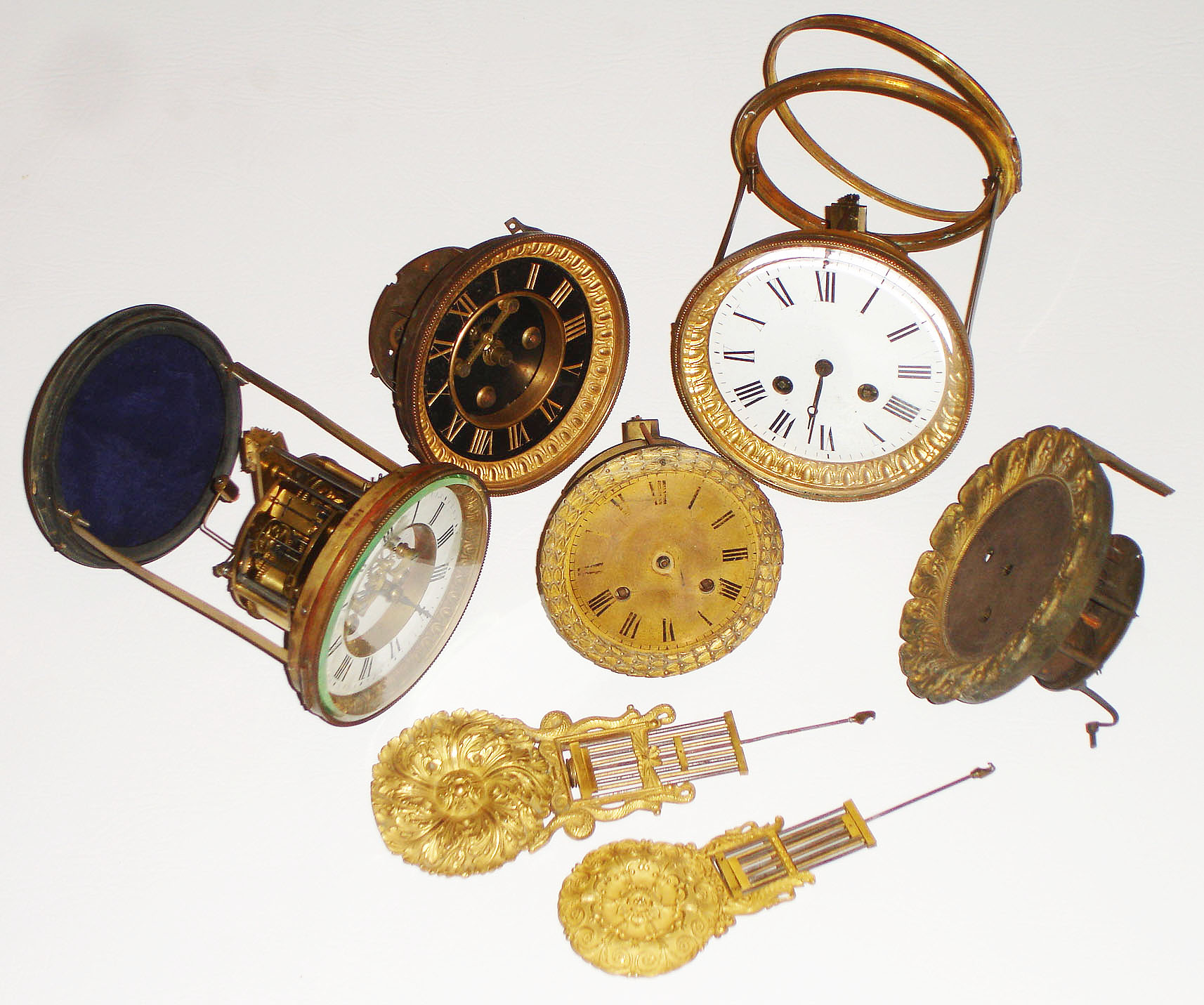 French clock movements- 5 (Five) with dials, 2 with rear case rings, plus 2 fancy gridiron pendulums, late 19th century — Antique Clocks Price Guide