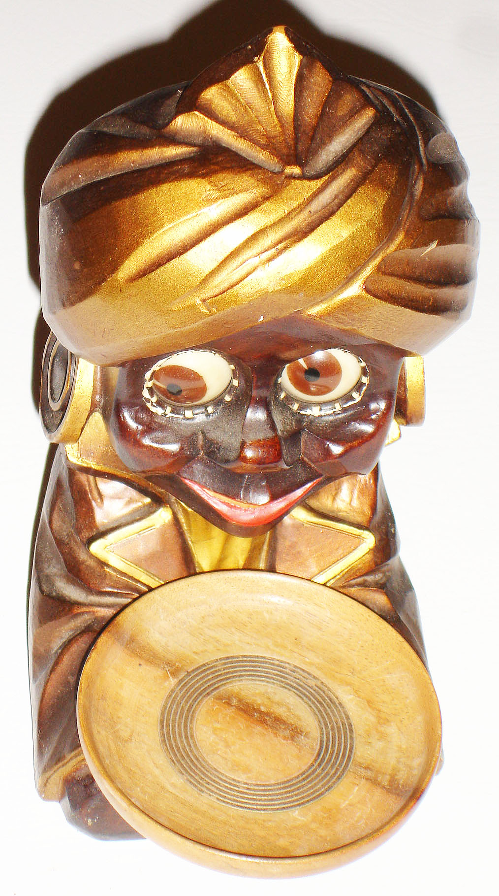 Oswald, Germany, "Sheik" cast composition rotating eye 30 hour novelty timepiece, c1948. — Antique Clocks Price Guide