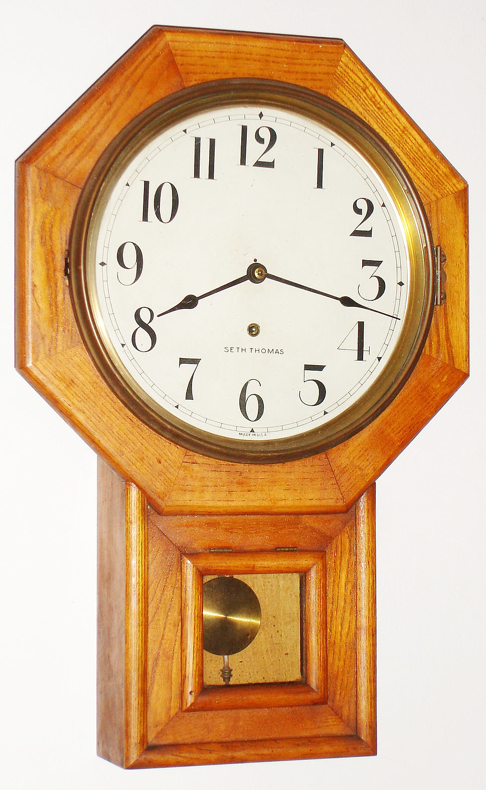 Seth Thomas Clock Co., Thomaston, Conn., oak, 8 day, time only, school clock, c1910 — Antique Clocks Price Guide