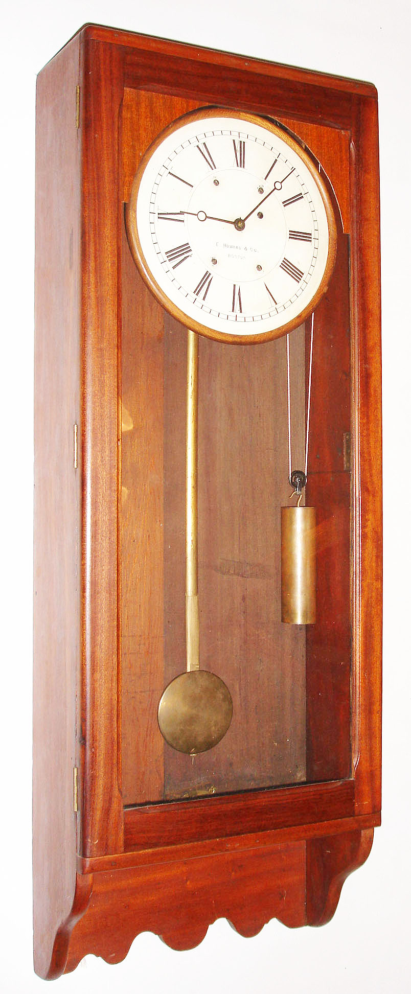 E. Howard and Co., Boston, Mass., industrial-style wall clock, 8 day, weight driven, time only movement in a mahogany case with painted metal dial, mov't circa 1900, case unknown. — Antique Clocks Price Guide