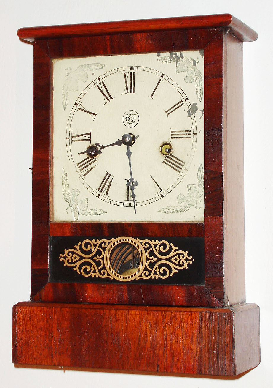 Waterbury Clock Co., Waterbury, Conn., 30 hour, time and strike, cottage clock, c1875 — Antique Clocks Price Guide