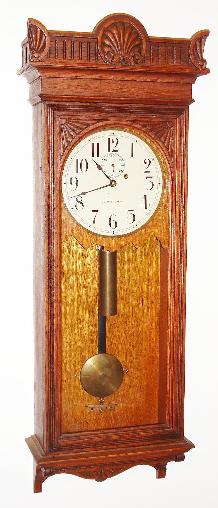 Seth Thomas Clock Co., Thomaston, Conn., "Regulator No. 9", 8 day, oak case weight wall timepiece, c1896 — Antique Clocks Price Guide