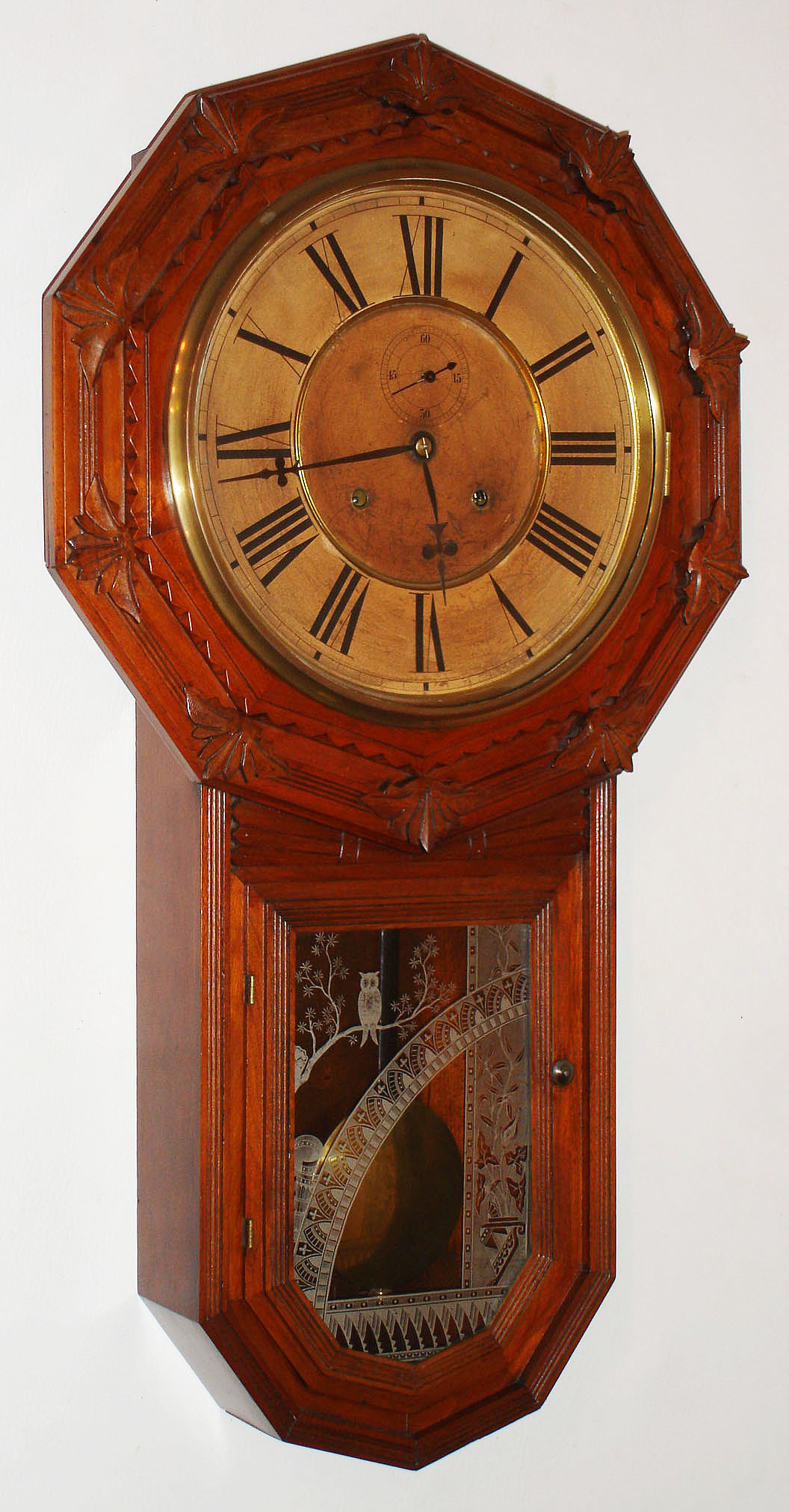 Wm. L. Gilbert Clock Co., Winsted, Conn., "Star Drop" walnut, 8 day, time and strike, long drop wall clock, C1881 — Antique Clocks Price Guide