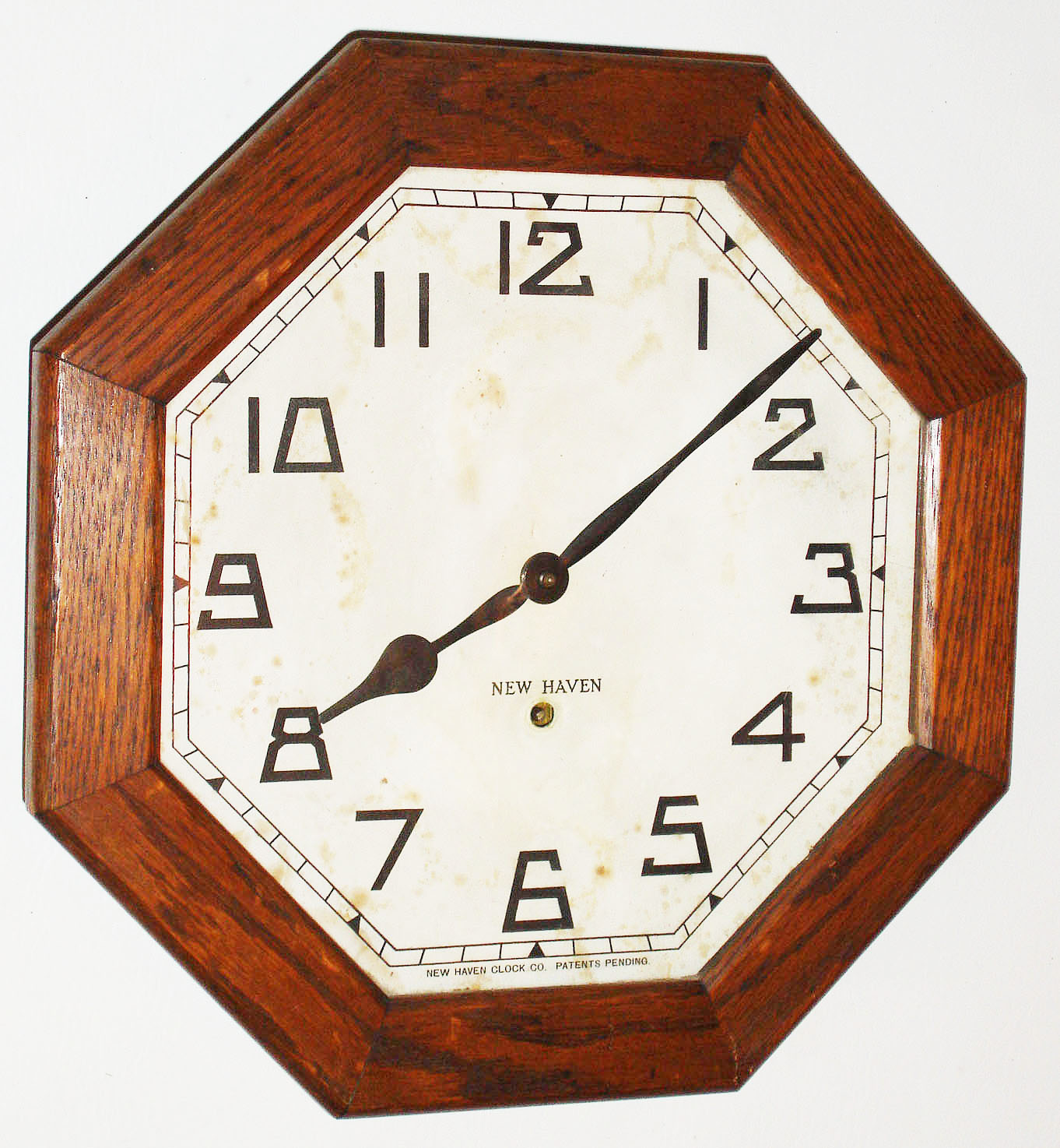 New Haven Clock Co., New Haven, Conn., "Gallery" oak 8 day octagonal wall clock, c1930 — Antique Clocks Price Guide