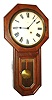 Seth Thomas Clock Co., Thomaston, Conn., "Globe" wall clock, 8 day, time only, spring driven movement in an oak case with painted metal dial, c1896