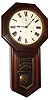 Seth Thomas Clock Co., Thomaston, Conn., "World" wall clock, 15 day, time only, spring driven movement in a rosewood veneer case with painted metal dial and lower tablet with aftermarket gold leaf advertising for "OTTO H. FASOLDT WATCH AND CLOCKMAKER N. Pearl St. Albany, N.Y.", c1880