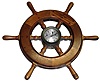 Chelsea Clock Co., Boston, Mass., "Helm's Mate" brass 8 day ship's bells 3.5" dial marine clock sold by Bailey, Banks and Biddle Co., mounted in a mahogany ship's wheel, c1952