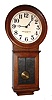 Chelsea Clock Co., Boston, Mass., "No. 1 Pendulum" wall clock, 8 day, time only, weight driven movement in an oak case with painted aluminum dial signed "BOARD OF EDUCATION NEW YORK", c1900