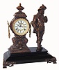 Ansonia Clock Co., New York, NY, "DON JUAN" figural clock, a cast metal figure of the infamous libertine, the clock mounted in the tower beside, and both mounted to a heavy black enameled cast iron base, c1894