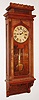 Wm. L. Gilbert Clock Co., Winsted, Conn., "Regulator No. 10" variant wall clock, 8 day, time only, weight driven movement in a walnut case with paper dial and "STANDARD TIME" stencil on lower tablet, c1901