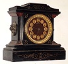 Ansonia Clock Co., New York, NY, enameled black iron, 8 day, time and strike, mantel clock, c1904