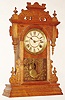 Seth Thomas Clock Co., Thomaston, Conn., "Tampa" oak time and strike 8 day city mantel clock, c1894