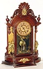 New Haven Clock Co., New Haven, Conn., "Occidental" walnut, 8 day, time and strike, mirror side mantel clock, c1895