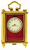 Switzerland, Lauret Watch Co. Inc, small travel clock with outer case, 7 jewels, stem wind and set nickel plate movement, with lever escapement in a gilt brass, red guilloche enamel case, and Arabic numeral, white painted metal dial in a green cloth covered travel case with brass catch, c1940