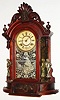 Ansonia Clock Co., New York, NY, "Triumph" or Mirror Side, 8 day, time and strike walnut mantel clock, c1900