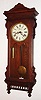 Waterbury Clock Co., Waterbury, Conn., "Regulator No. 57", 8 day, double weight oak case wall timepiece, c1906