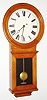 Eastman Clock Co., Boston , 8 day, weight wall time piece in an oak case with painted metal dial, serial number 688, c1886