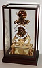 Skeleton clock, Chinese reproduction, 8 day fusee with passing strike, lacquered brass in wood and glass case, contemporary