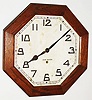 New Haven Clock Co., New Haven, Conn., "Gallery" oak 8 day octagonal wall clock, c1930
