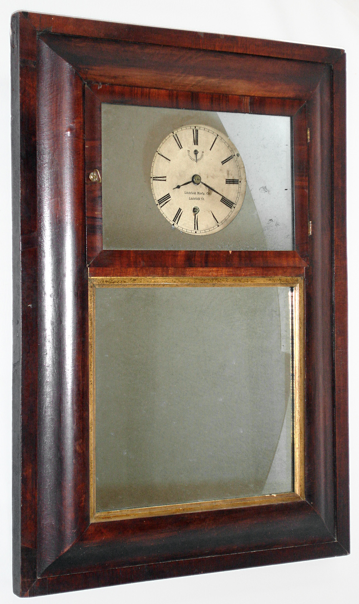 Litchfield Manfg. Co., Litchfield, Conn., mirror clock, 8 days time only, spring driven balance wheel movement in a mahogany case, c1850, — Antique Clocks Price Guide