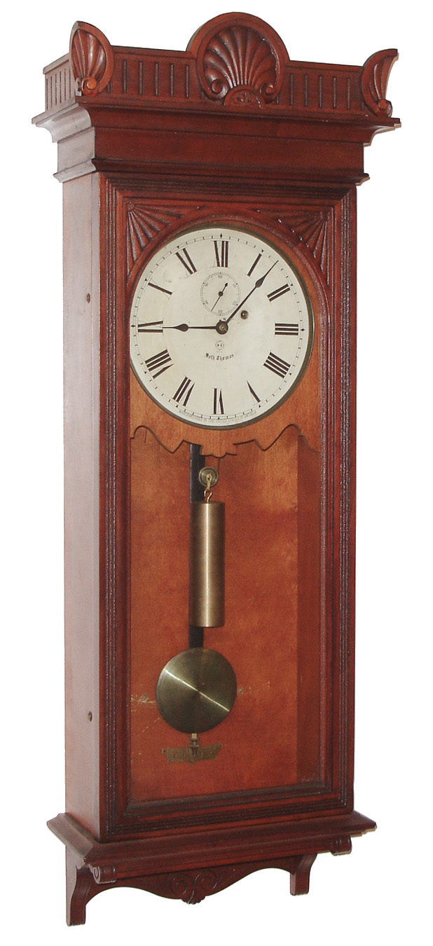 Seth Thomas Clock Co., Thomaston, Conn., "Regulator No. 9" wall clock, 8 day, time only, weight driven movement in a cherry case with a painted metal dial, c1890 — Antique Clocks Price Guide