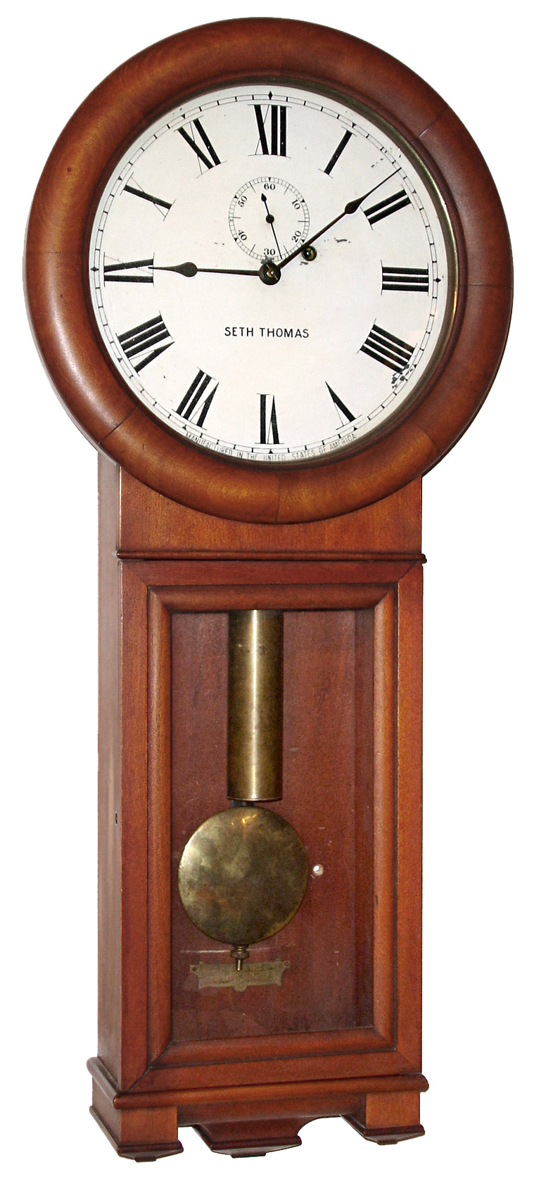 Seth Thomas Clock Co., Thomaston, Conn., "Regulator No. 2", wall clock, 8 days, time only, weight driven movement in a cherry case with painted metal dial, dated 1909 — Antique Clocks Price Guide