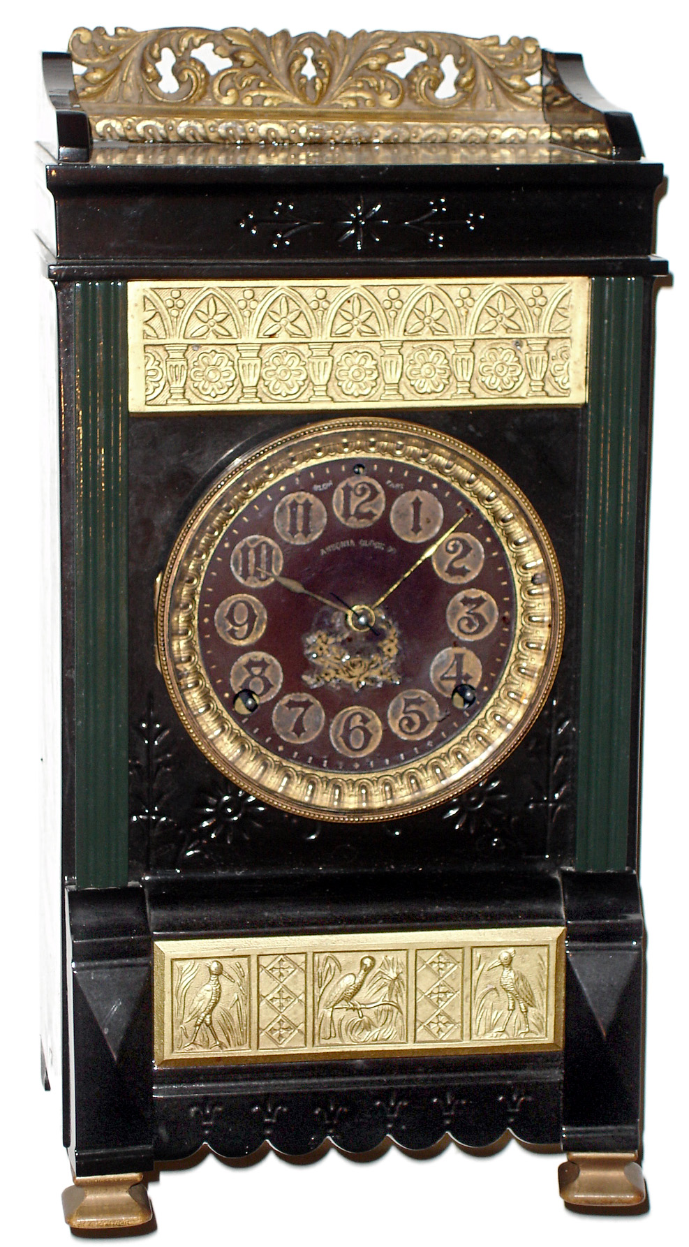 Ansonia Clock Co, New York, "Turin" enameled iron shelf clock, 8 days, time and strike, spring driven movement, and with Ansonia patent hard rubber dial, c1883 — Antique Clocks Price Guide