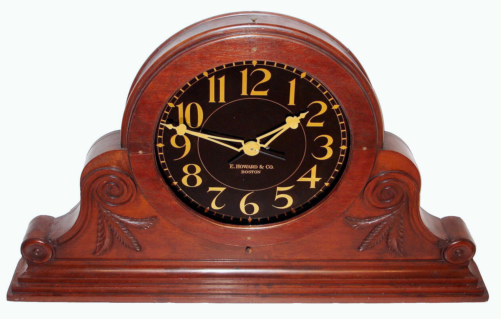 E. Howard & Co., Boston, Mass., "No. 29 Gallery" clock, 8 days, time only, compounded weight driven movement with external slow / fast adjustment in a mahogany case with 24" reverse painted glass dial, c1930 — Antique Clocks Price Guide