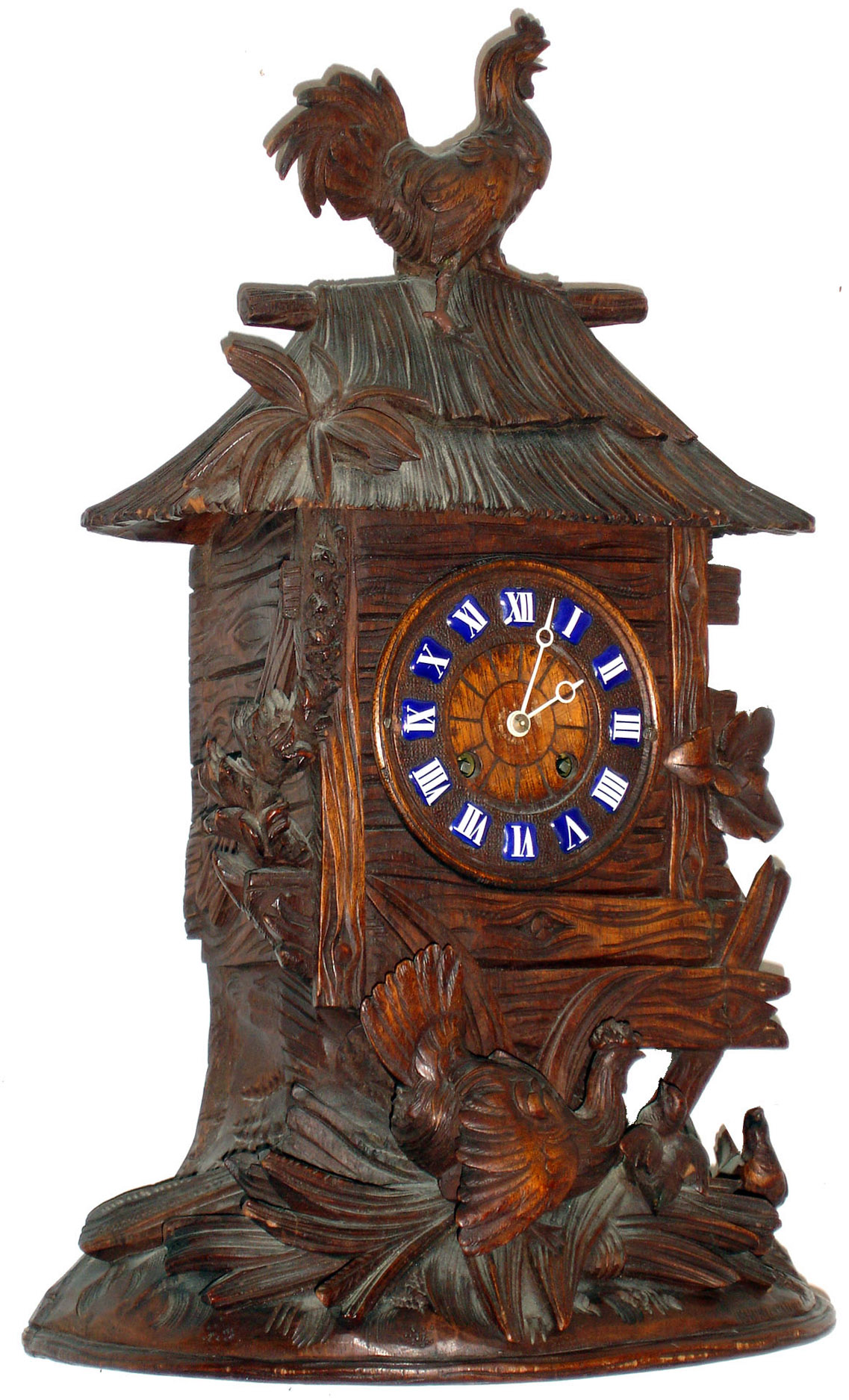 Swiss mantel clock, Japy Freres 8 days, time and strike, movement, back plate also marked "M.R. & Co.", in a beautifully carved Swiss case, a rooster atop shed with thatch roof, the hen below in foliage feeding her young, wooden dial with blue enamel cartouche Roman numerals, Breguet style hands, c1880 — Antique Clocks Price Guide