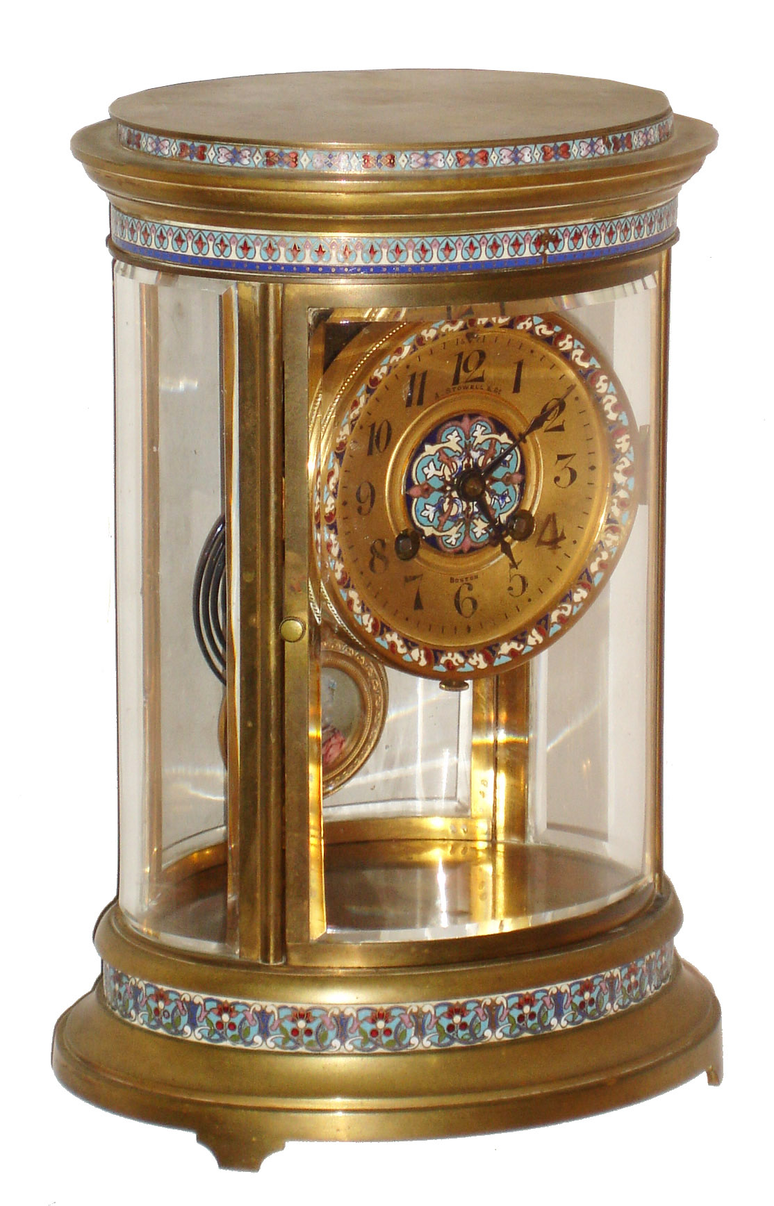 French crystal regulator, Japy Freres 8 days, time and strike, movement, counting the hours on a gong and a single blow at the half hour, the gilt oval case with beveled glasses and cloisonne bands at the top and bottom, gilt Arabic numeral dial signed "A. Stowell Boston", with cloisonne border and center, blued steel hands, gilt pendulum with miniature portrait of a fashionable woman behind glass, signed "T. Karl", c1900 — Antique Clocks Price Guide