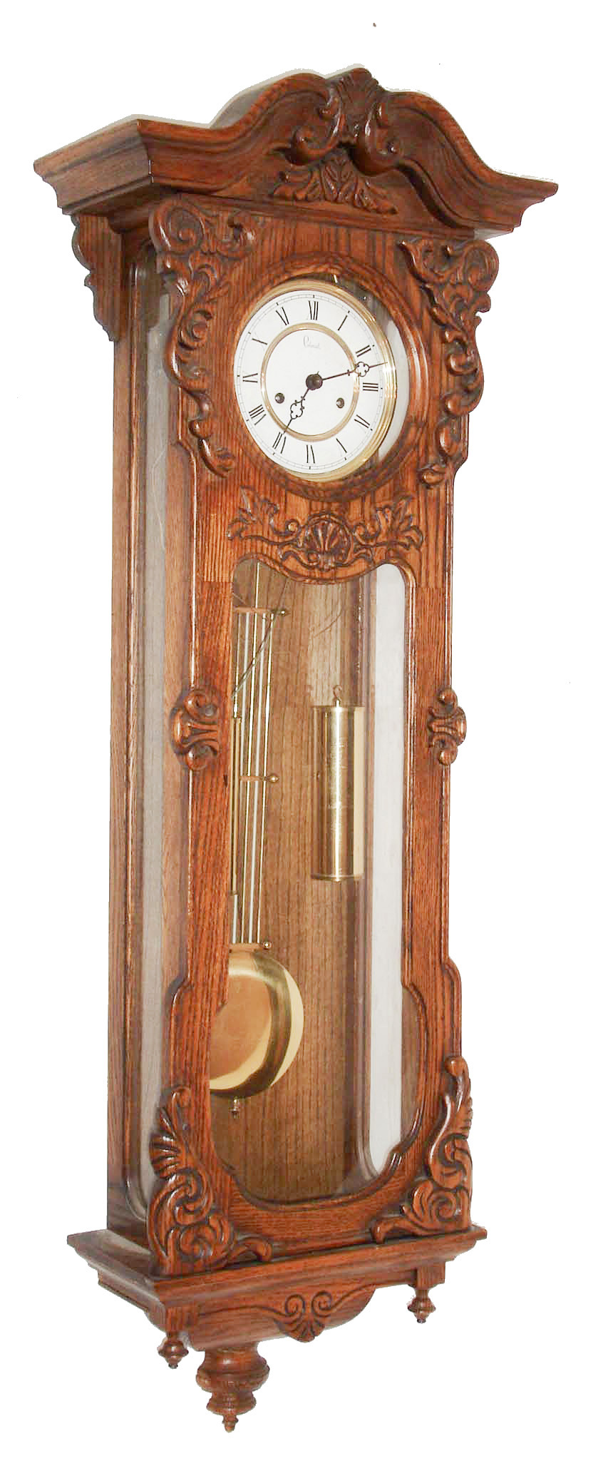 Colonial Clock Co., Zeeland, Michigan, reproduction oak 8 days, time and strike, weight driven wall clock, c1980 — Antique Clocks Price Guide