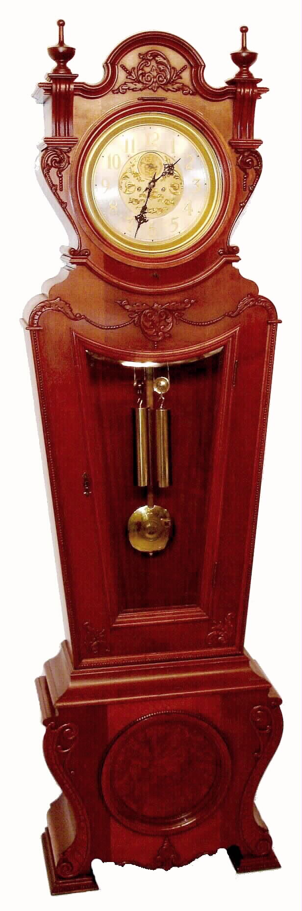 Waterbury Clock Co., Waterbury, Conn., "Regulator No. 62" floor standing regulator, 8 days, time and strike, two weight driven movement in a mahogany case with unusual keystone shape with silvered dial and raised brass numerals and fancy center, c1890 — Antique Clocks Price Guide