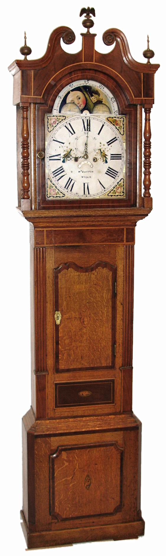 William Barton, Wigan, England, tall clock, 8 day, time, calendar, moon phase and bell strike movement in an oak case with broken arch, mahogany highlights and inlay and painted iron dial, c1850 — Antique Clocks Price Guide