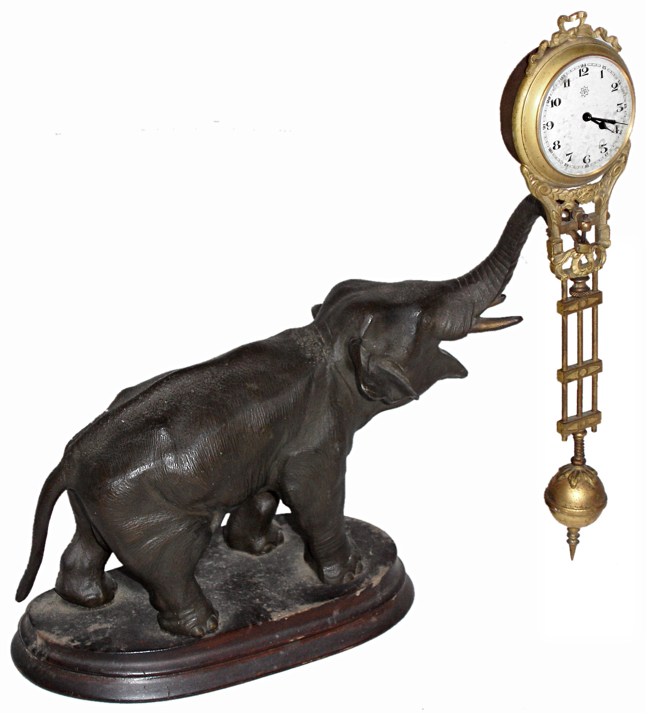 Junghans, Germany, 8 days, elephant cast metal swing clock, c1910 — Antique Clocks Price Guide