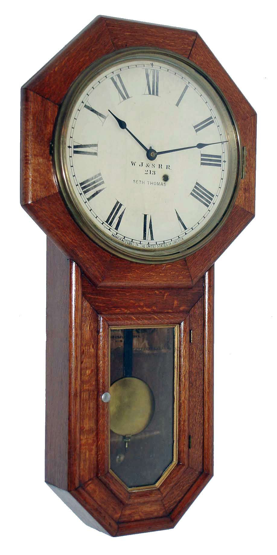 Seth Thomas Clock Co., Thomaston, Conn., "Globe", 8 day, quartered oak wall timepiece, c1896  The initials on the dial: "W. J. & S. R. R." is the abbreviation for the "West Jersey & Seashore Rail Road".  In the 1900 edition of "Statistics of Railways in the United States" this railroad operated under the Pennsylvania RR system claiming assets of over 11 million dollars, 330 miles of track and carrying 2 million passengers annually. — Antique Clocks Price Guide