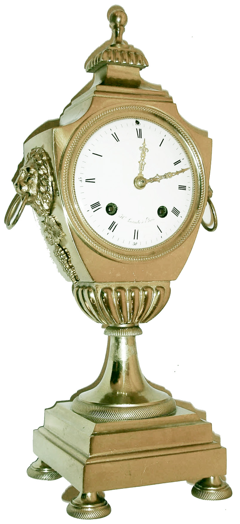 J.C. Laresche  Paris, France Empire table clock, 8 days, time and strike, silk thread suspension movement in a gilt case flanked by lions holding rings and bunches of grapes with white enamel dial and fancy hands, c1820 — Antique Clocks Price Guide