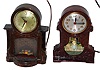Clocks- 2 (Two) MasterCrafters, Chicago, Ill, plug-in electric automaton timepieces: swinging doll and fireplace, c1950.
