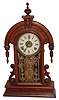 Welch, Spring & Co., Forestville, Conn., "Parisian" walnut 8 days, time, strike & alarm shelf clock, c1885