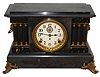 Seth Thomas Clock Co., Thomaston, Conn., "Eight Day Long Alarm", 8 day, time and strike, with alarm black adamantine case mantel clock.  This model was also offered as a standard time and strike, version known as the Keswick. c1909
