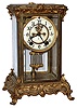 Ansonia Clock Co., Brooklyn, New York, "Peer" brass and beveled glass 8 days, time and strike, crystal regulator with visible escapement, c1914