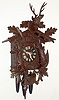 German carved wood three weight quarter striking cuckoo and quail wall hanging clock, c1910