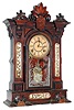 William L. Gilbert Clock Co., Winsted, Conn., "Amphion" walnut 8 days, time and strike, mantel clock, c1885
