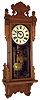 William L. Gilbert Clock Co., Winsted, Conn., "Thespian" walnut 8 days, time and strike, wall clock, c1910