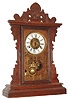 The American Wringer Co., New York, "Eclipse", 8 day, time and strike, and alarm oak case kitchen clock. c1900