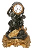 Claude Hemon, Paris, France, bronze figural mantle clock, 8 day, time and strike, spring driven movement signed Hemon , Paris with silk thread suspension in a patinated bronze and brass case depicting two figures harvesting wheat and a cast brass bezel in wheat motif and white enamel dial, c1830