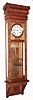 William L. Gilbert Clock Co., Winsted, Conn., "Regulator No. 12 Hanging" wall clock, 8 days, time only, weight driven Swiss movement with a three glass vial mercury pendulum, sweep seconds and pinwheel escapement in an oak case with white enamel dial and glass displaying "STANDARD TIME", c1895