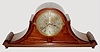 J.J. Elliott, London, England, one of the worlds largest tambour clocks, the walnut case with paneled front, heavily molded base and trim, terminating at each end in a volute with acanthus leaf, heavy cast bezel with thick beveled glass, silvered Roman numeral dial with blued steel hands, chime/ silent lever at 3:00, and heavy brass, 8 day, 3 fusee movement with full Westminster chiming on gongs, and counting the hours on a large gong, signed "J.J. Elliott 121 & 123 Rosebery Avenue London", with original key and pendulum c1910